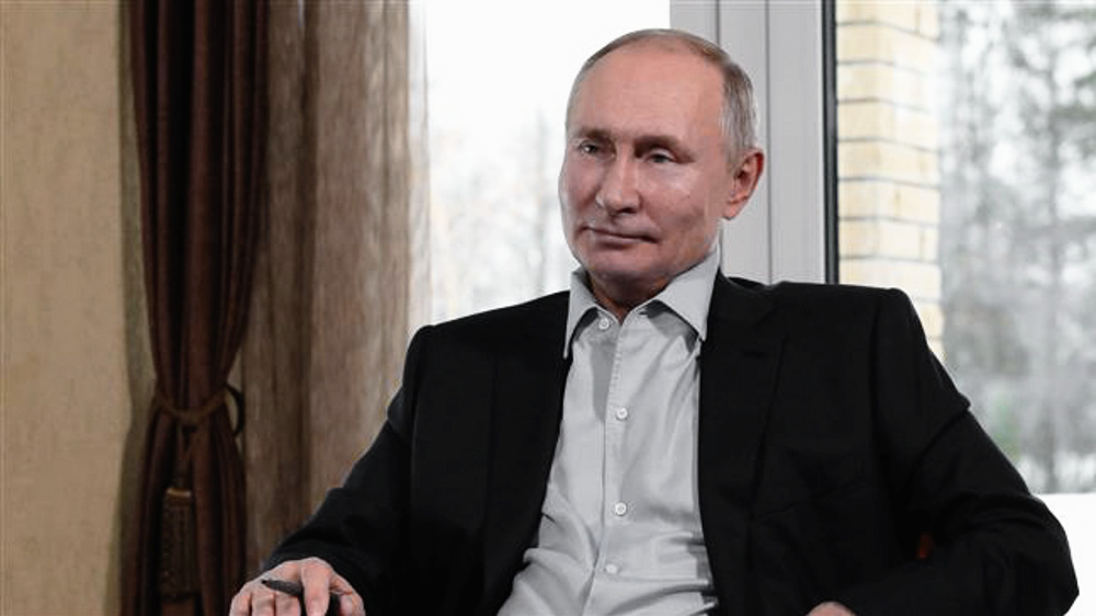 Putin backs free speech, condemns illegal Navalny protests