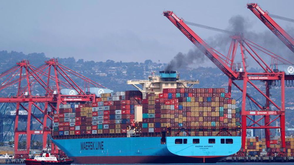 US goods trade gap hits record; pending home sales slip