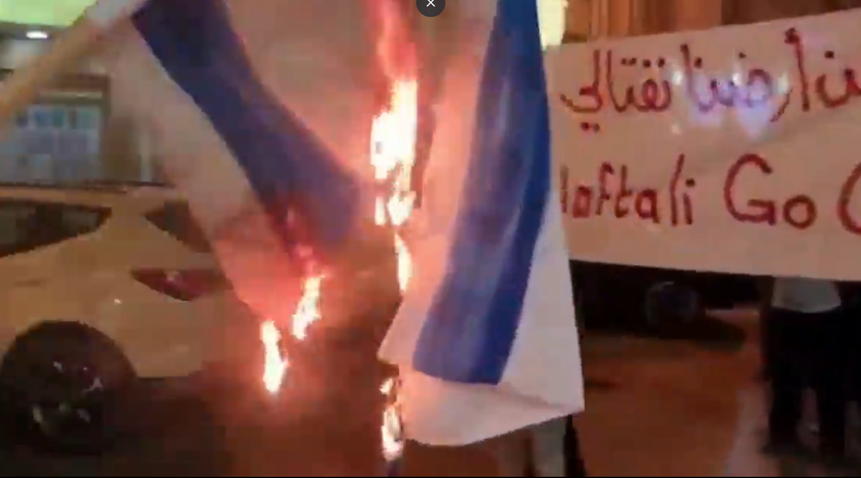 Israeli flag on fire as Bahrainis protest Bennett’s visit, normalization