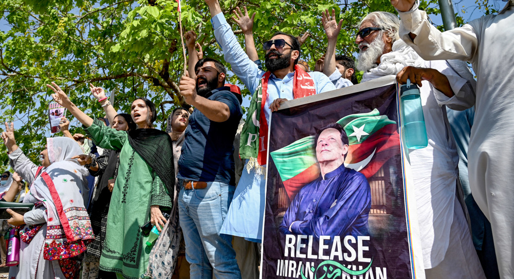 Pakistan court acquits Imran Khan, but he remains in jail