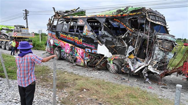18 dead in Thailand bus-train collision