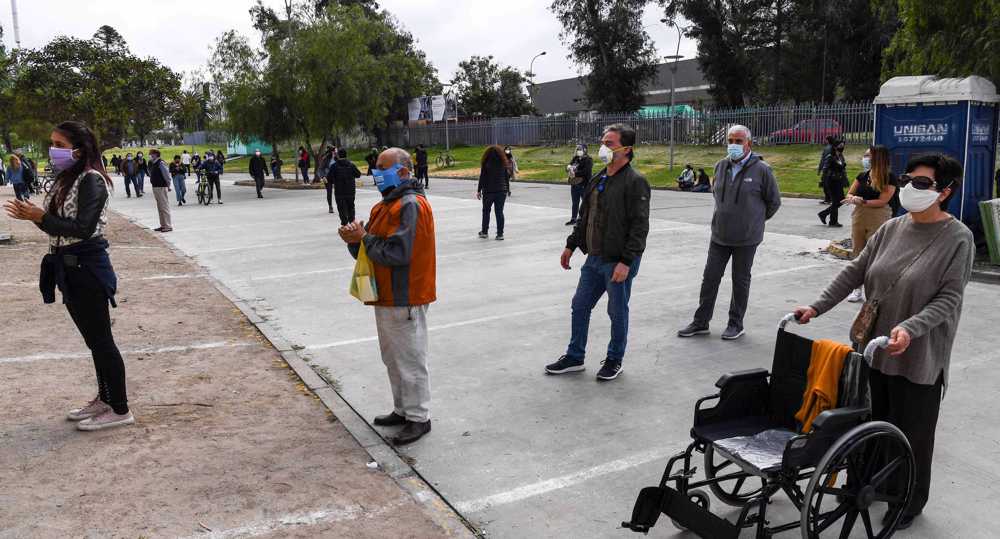 Polls open as Chile votes in referendum for change