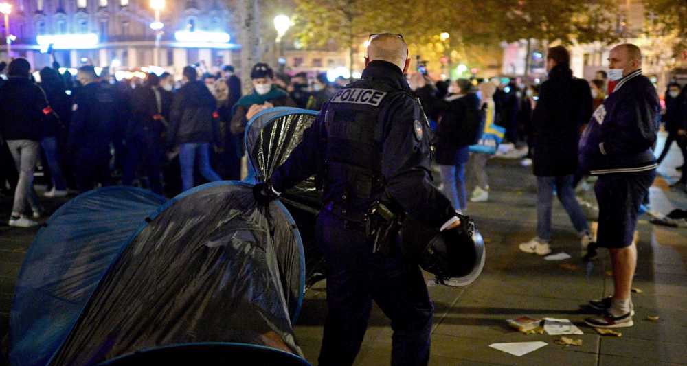France to probe Paris refugee camp dismantling after ‘shocking’ clashes