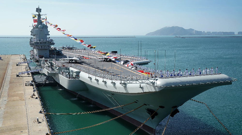 Taiwan deploys ships, aircraft as Chinese carrier crosses Taiwan Strait  