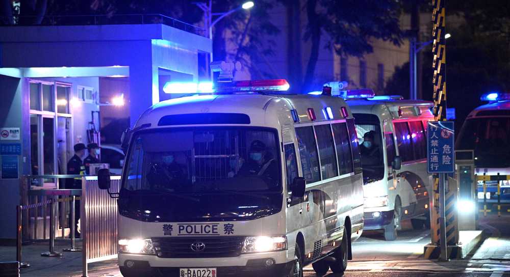 Chinese court jails 10 Hong Kong fugitives, returns 2 minors