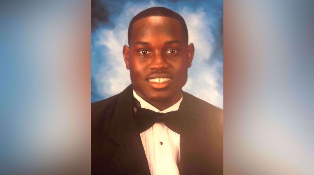 Video: Black man killed by white ex-cop, his son, DOJ probe sought