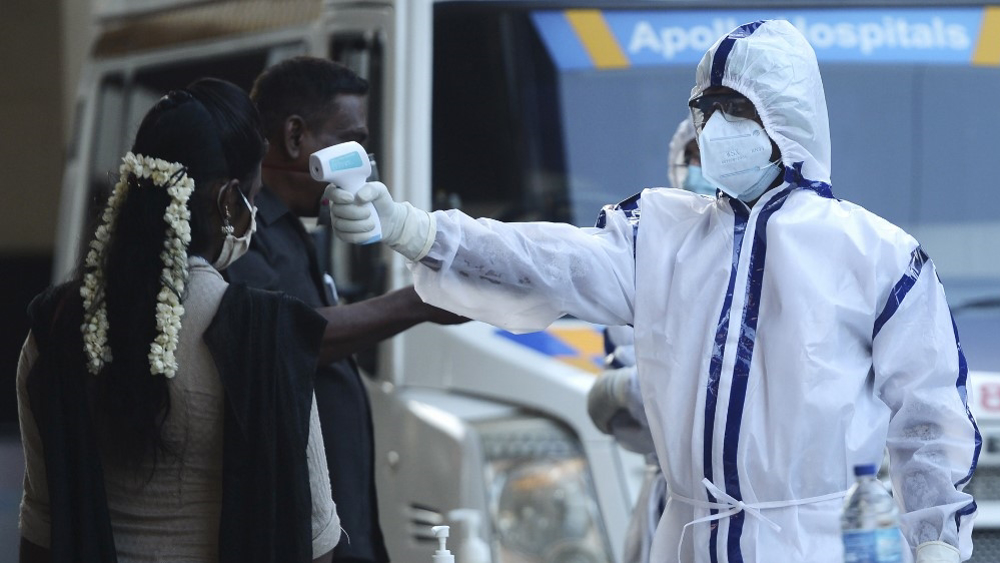 India's virus infections surpass China but officials upbeat 