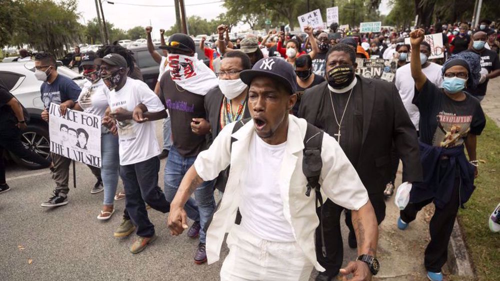Hundreds of protesters demand justice for Arbery at Georgia rally