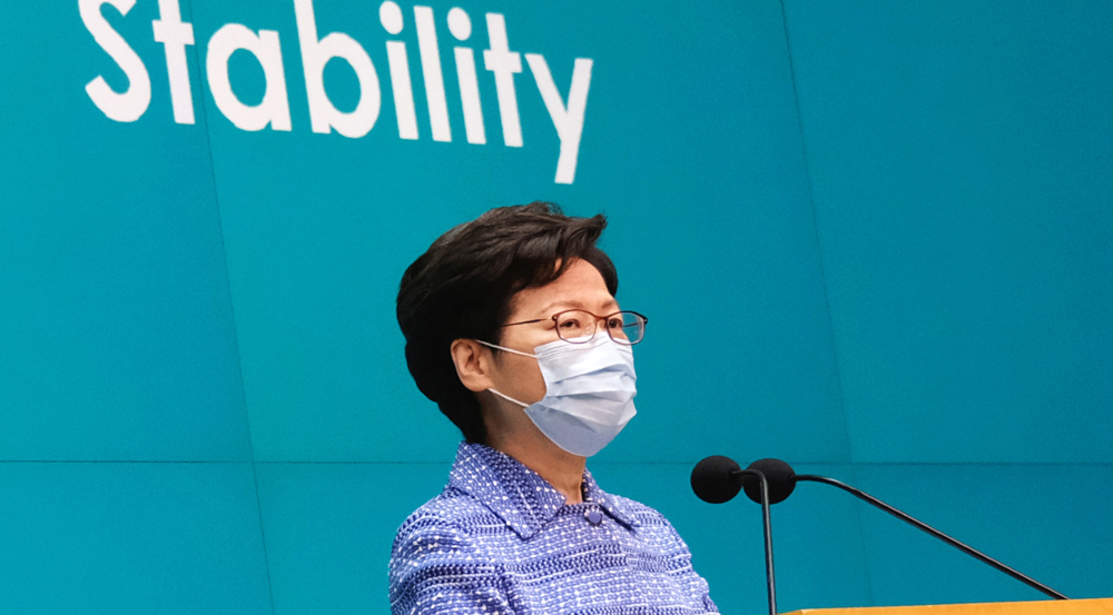 Hong Kong’s leader reaffirms new law would not harm rights, freedoms