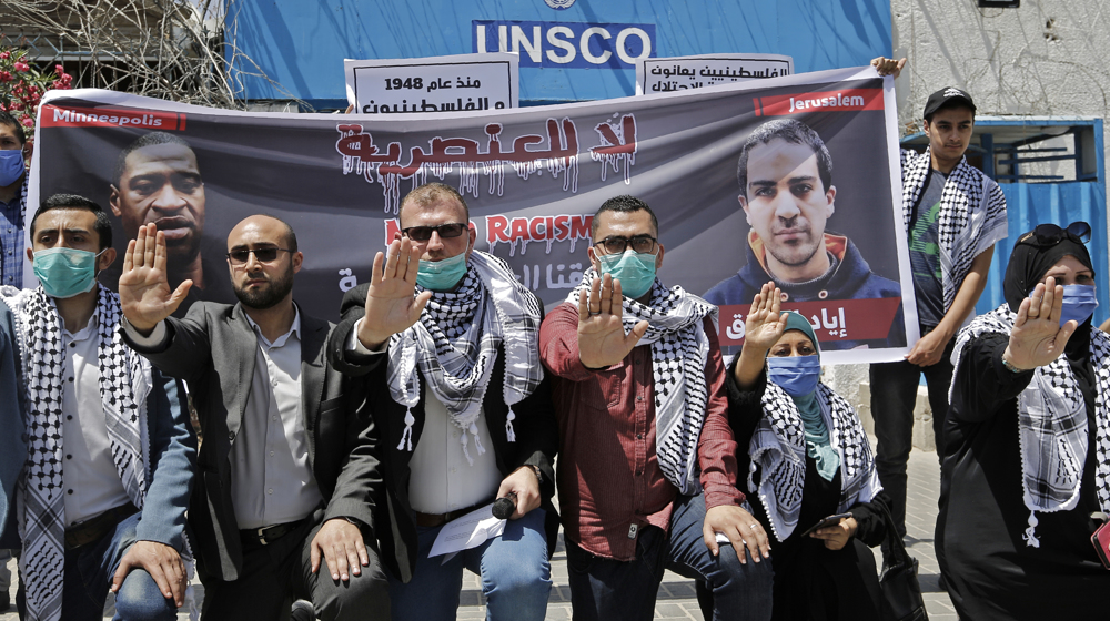 Palestinian demonstrators protest against racism in Gaza City