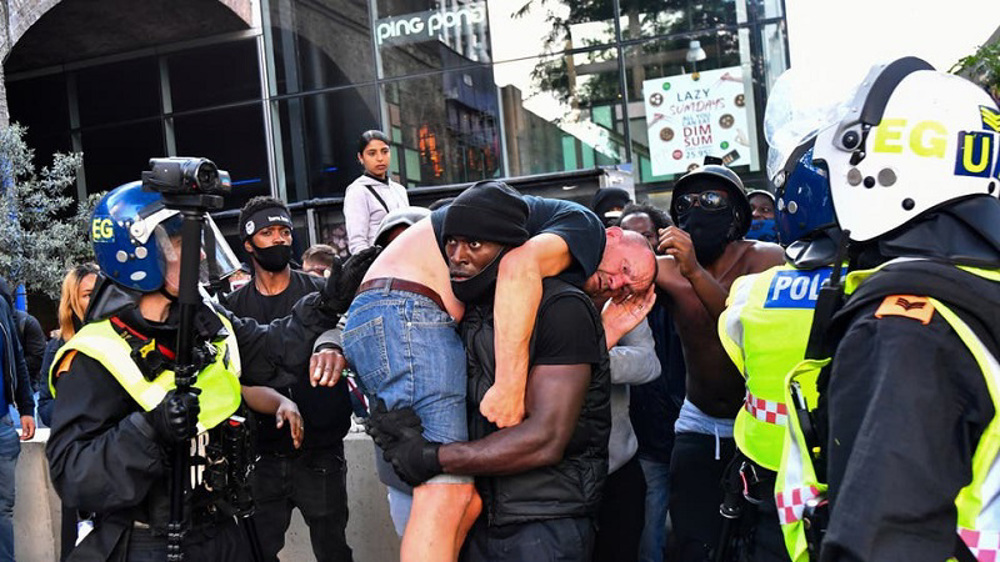 'I saw a human being not his color’: BLM activist who saved far-right protester