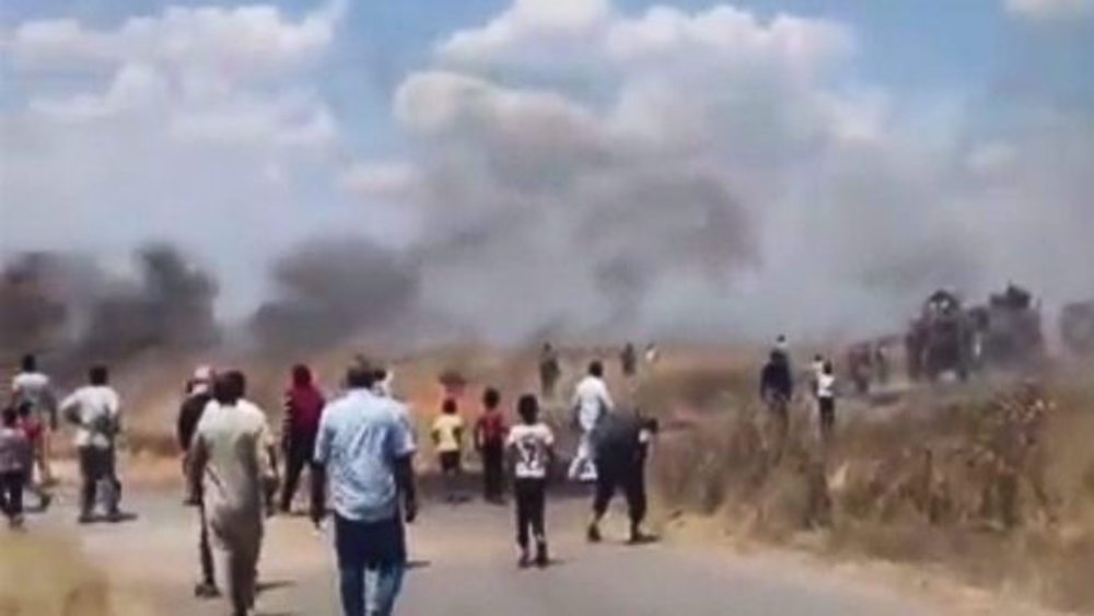 Locals hurl stones at US convoy in NE Syria, make it retreat
