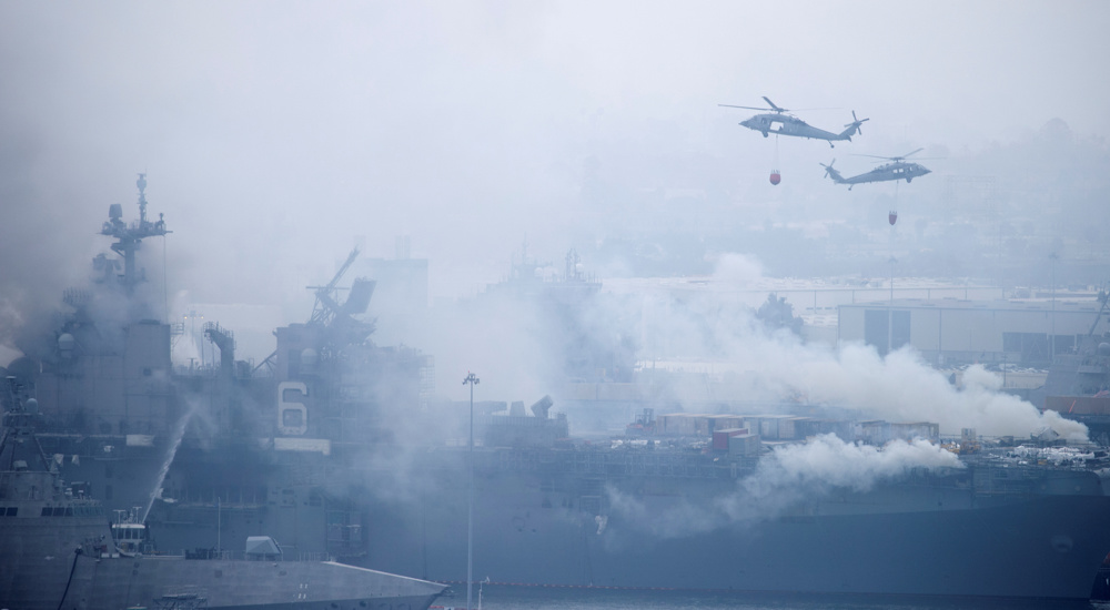 Two days on, US Navy battling to save burning warship in San Diego