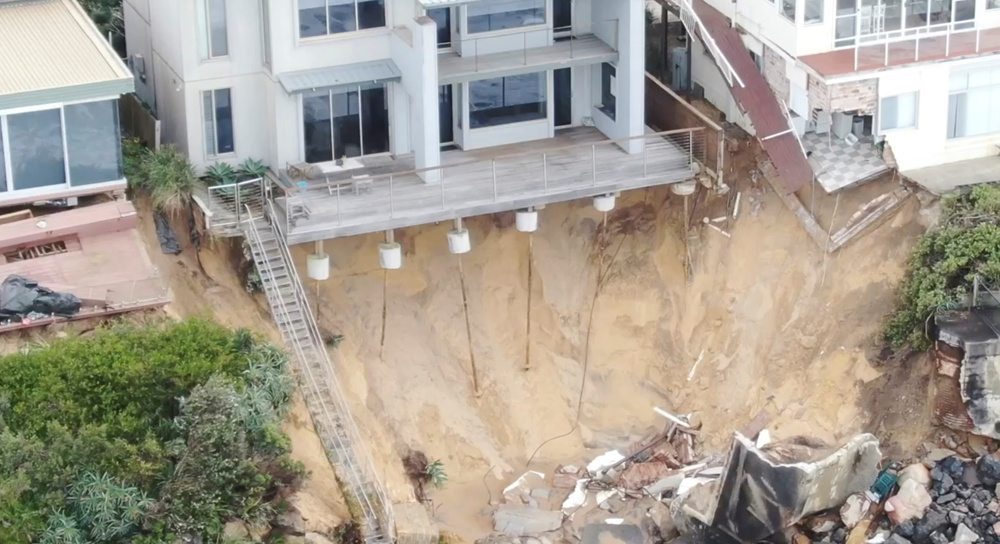 Australian homes on the brink of tumbling into the sea