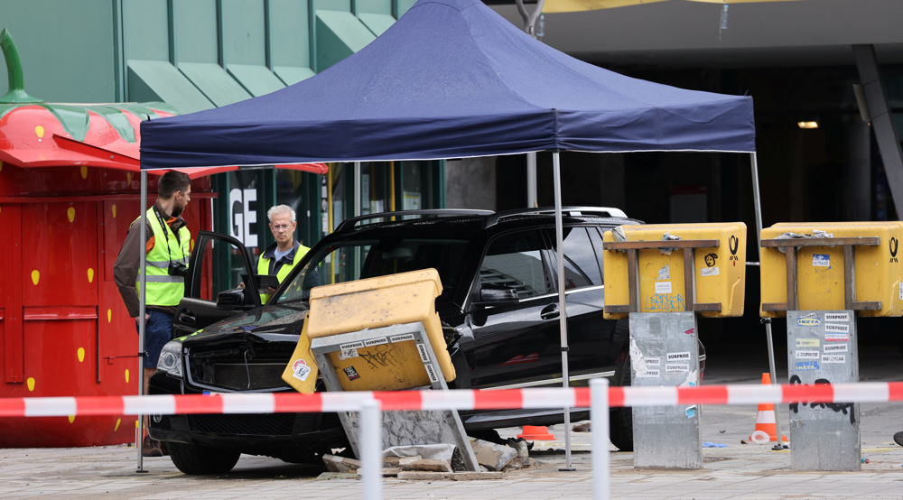 Car plows into people in German capital, 7 injured