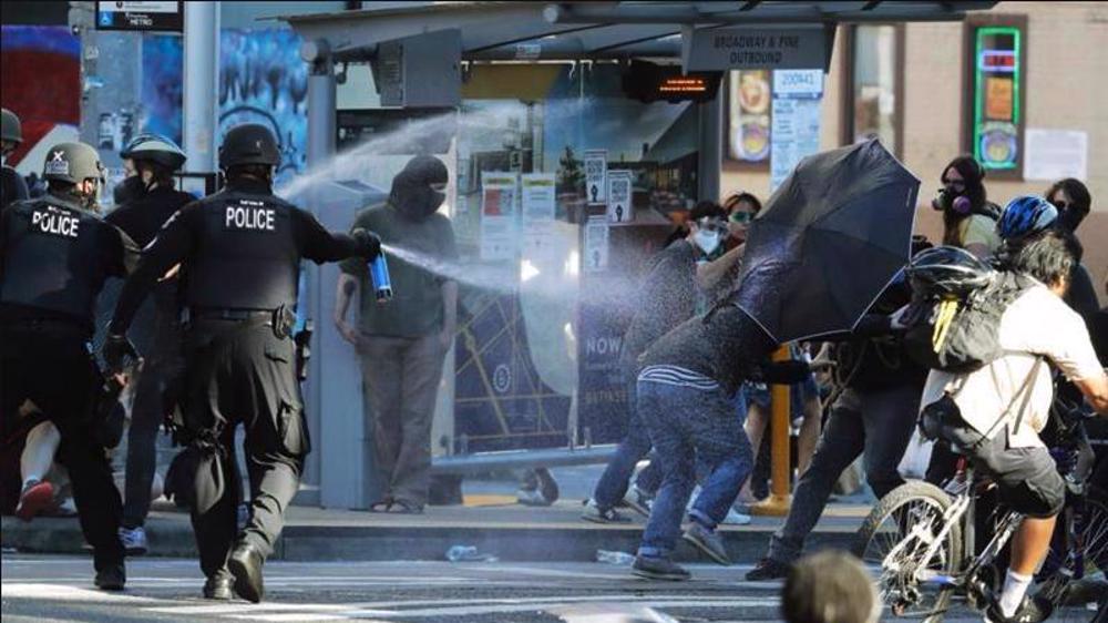 Oil giants help fund US police groups