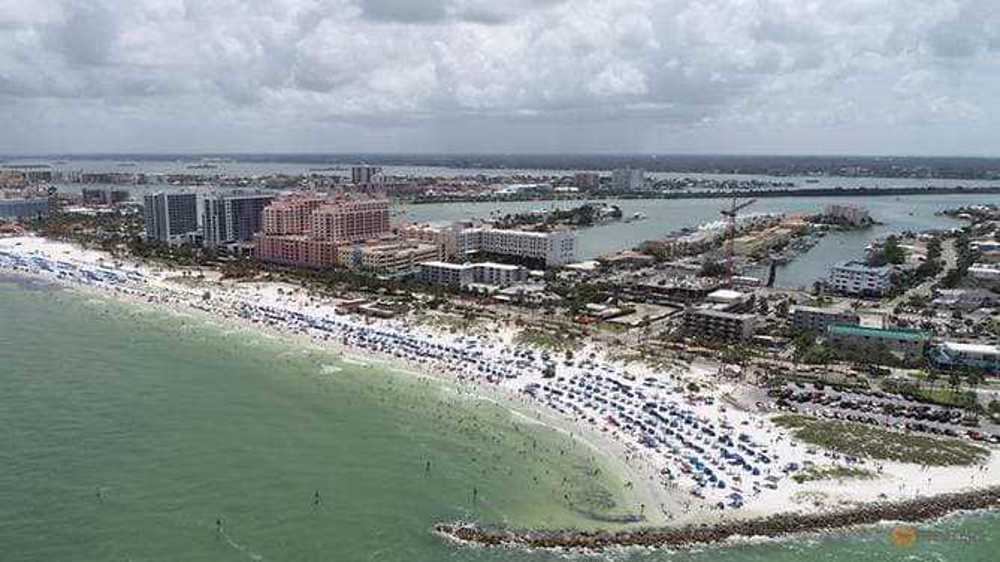 Florida, Texas post daily COVID-19 records as 'positivity' rates climb