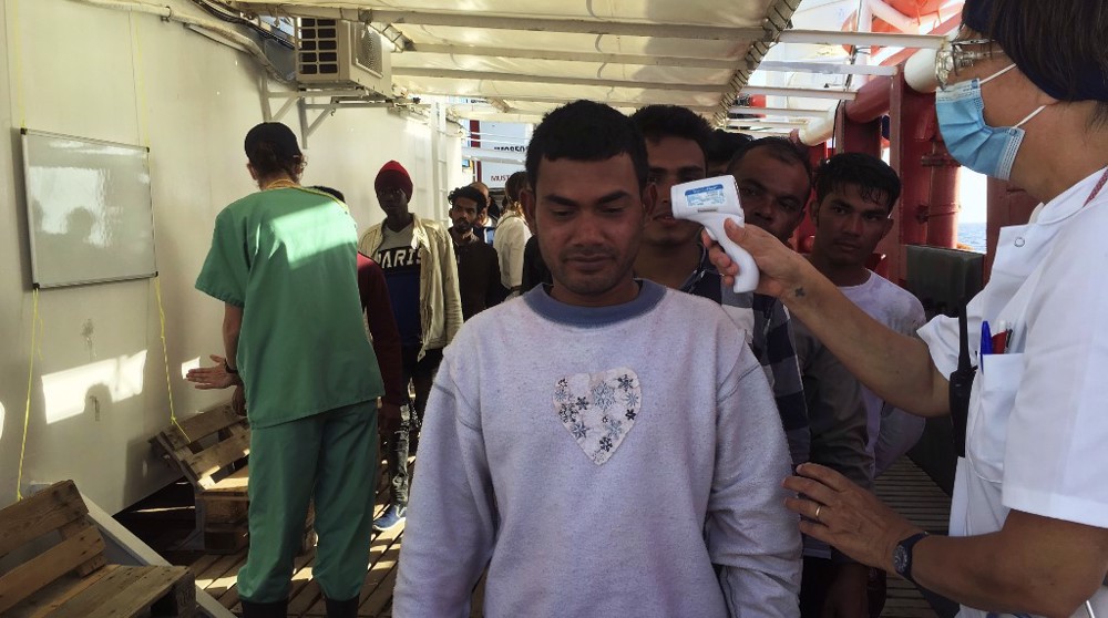 Refugees stranded in Mediterranean to be quarantined on Italian ship