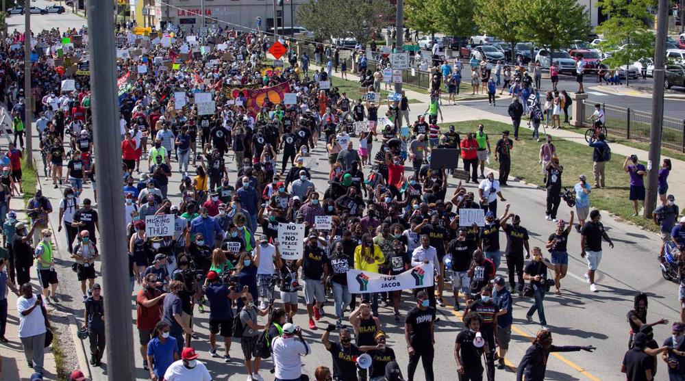 Trump to visit Kenosha as anti-racism protesters rally  