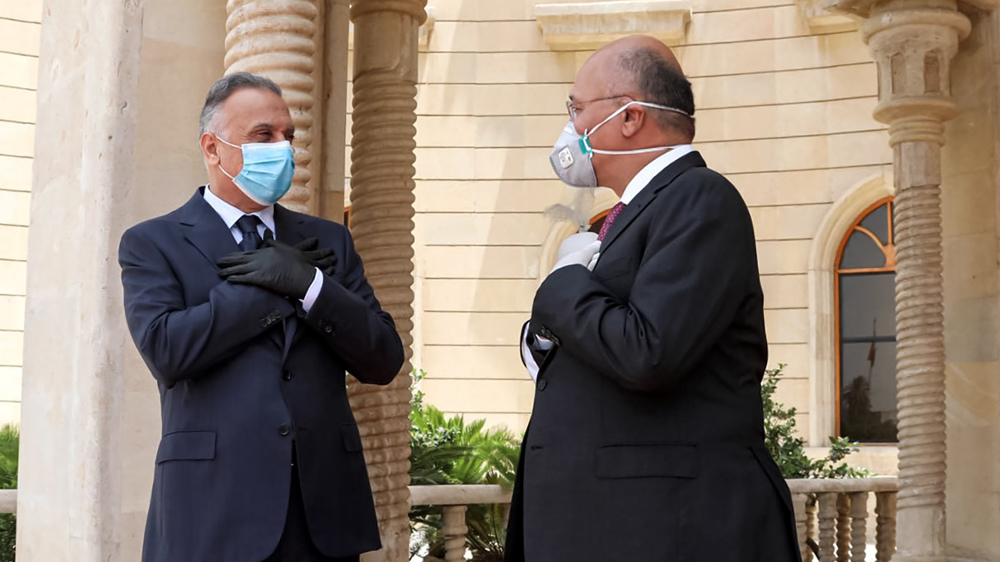 Iraq president welcomes PM Kadhimi’s call for early elections