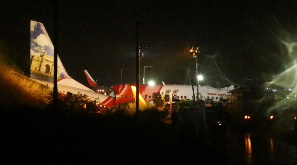 At least 18 dead as India airliner skids off runway after landing