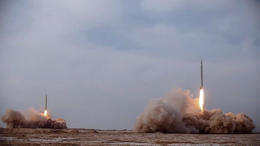 IRGC unveils new high tech ballistic missiles, combat drones