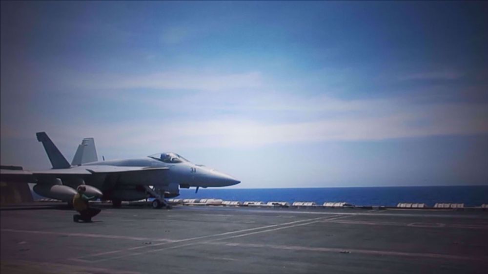 US sends carrier to South China Sea after Beijing gives fire order