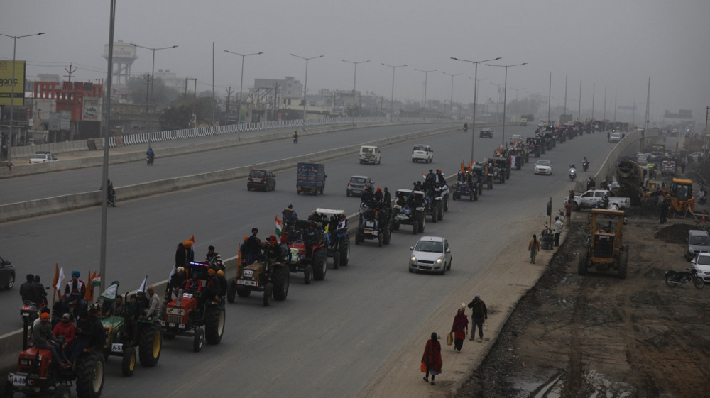 Indian farmers block highway near Delhi to protest new laws