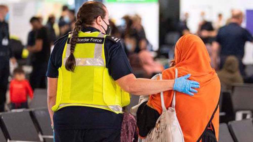 'Let us go back home,' beg Afghan refugees stuck in UK  