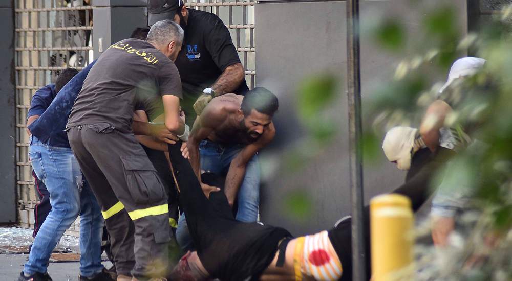 Six killed: Armed groups shoot protesters from rooftops in Beirut  