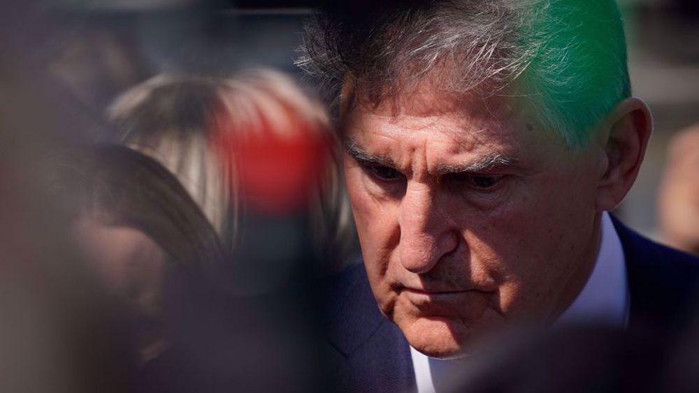 Manchin slams Sanders for supporting Biden spending plan