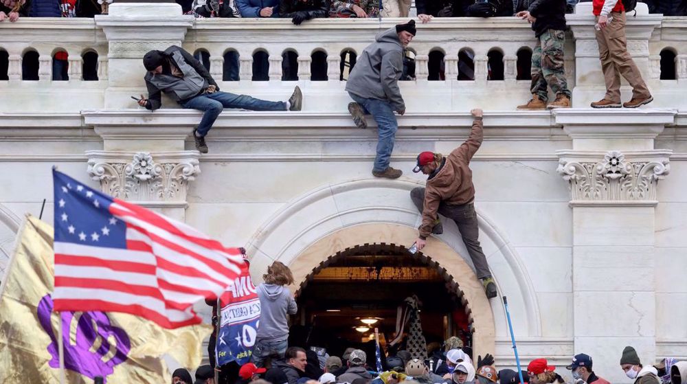 'Protester who sprayed US police will remain in detention’