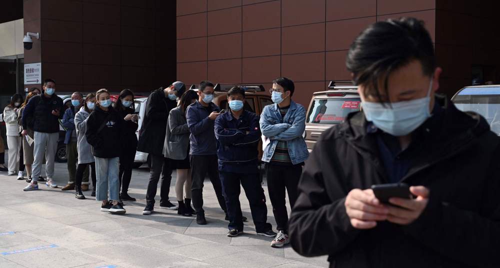 Hundreds of flights cancelled as China tackles COVID outbreak