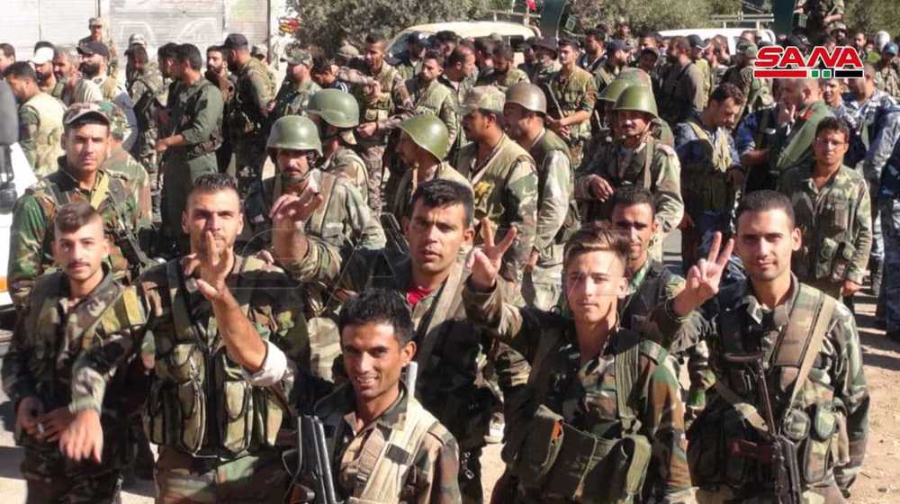 Syrian govt. forces comb southern city for hidden bombs, ordnance