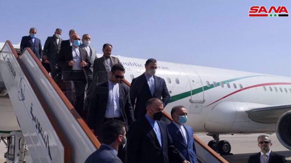 Iran foreign minister in Syria with pledge of strong support  