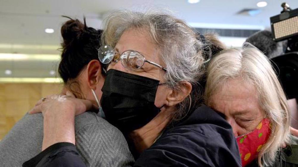 Flowers, cheers and tears as Australia's border reopens