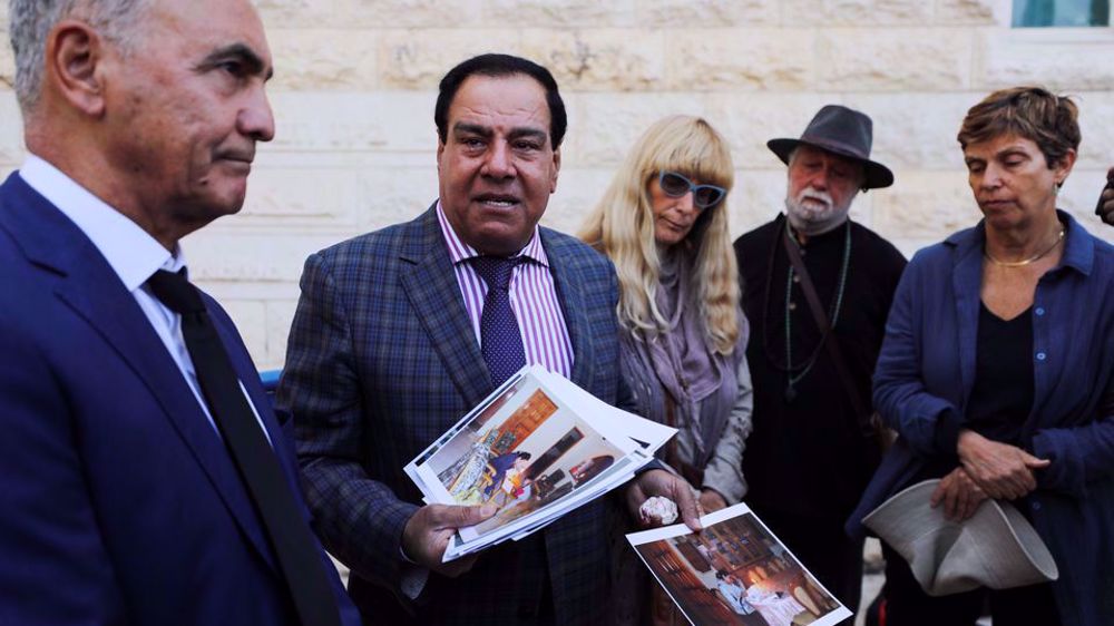 Palestinian doctor who lost daughters in 2009 war on Gaza sues Israel