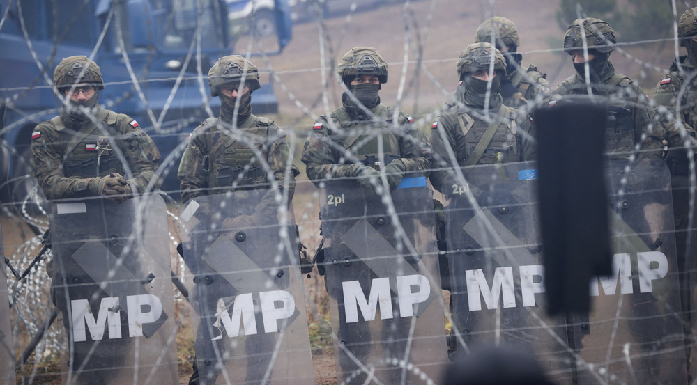 Poland urges NATO to take 'concrete steps' amid Belarus border crisis