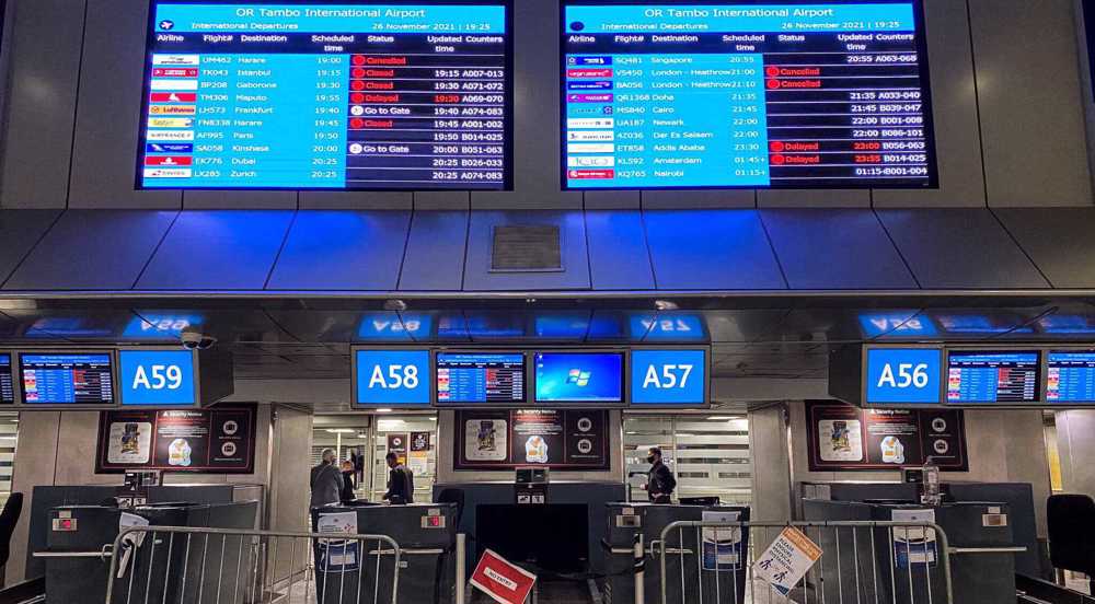 Countries close borders amid global alarm over new Covid variant 