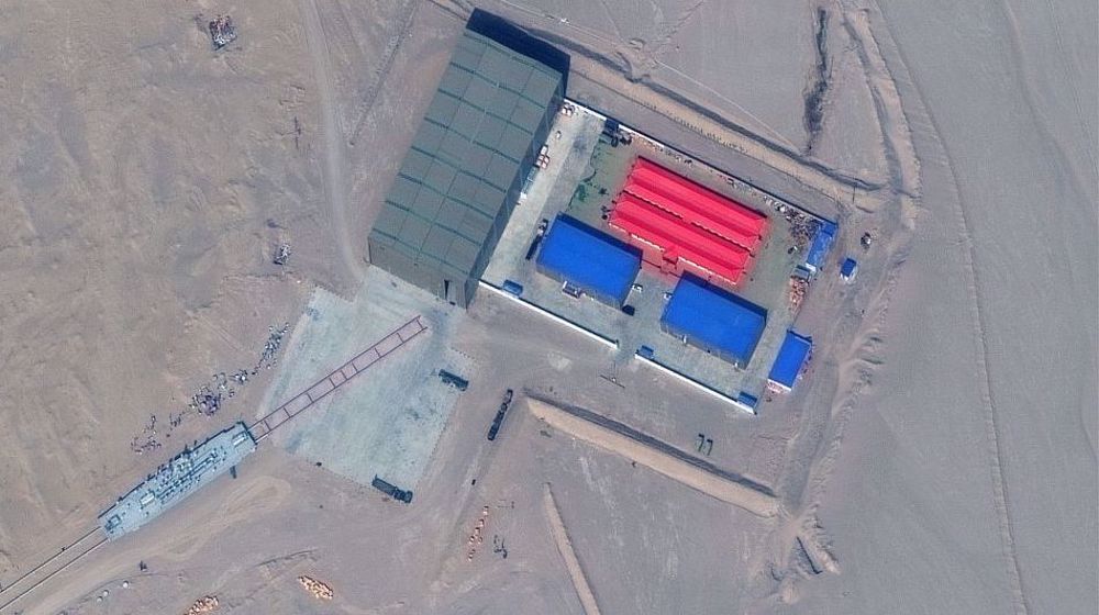 China builds mockups of US warships in desert military exercise