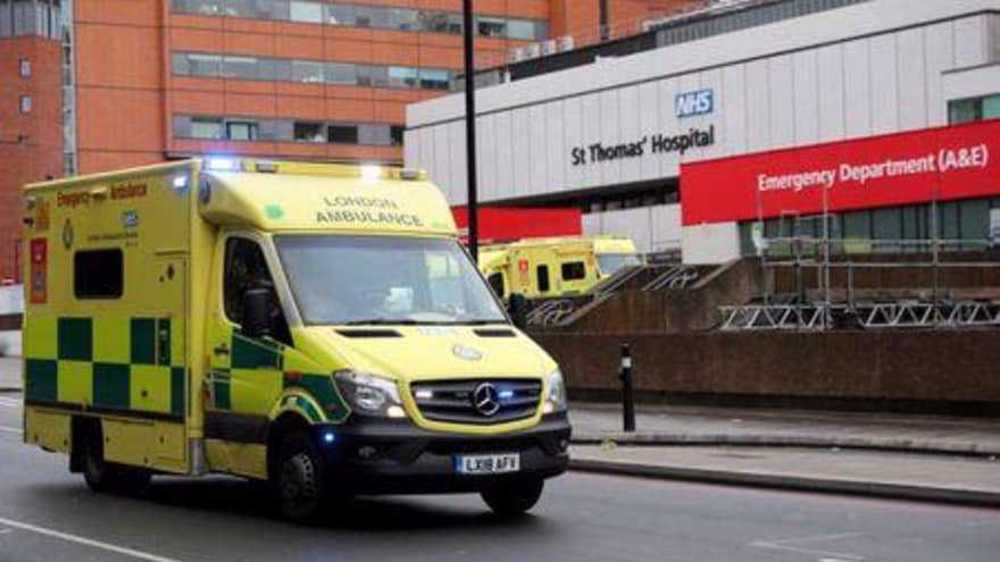 UK raises COVID alert level as Omicron runs rampant