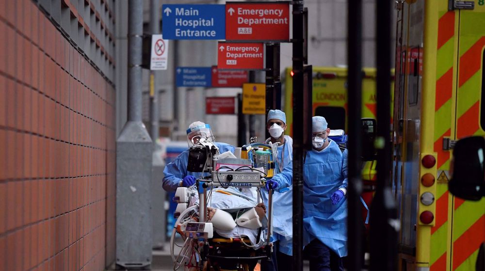 UK COVID cases hit record as hospitals struggle with staff shortages