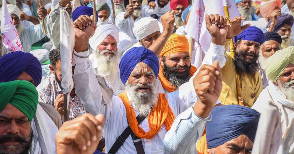 India formally repeals three farm laws after a year of protests