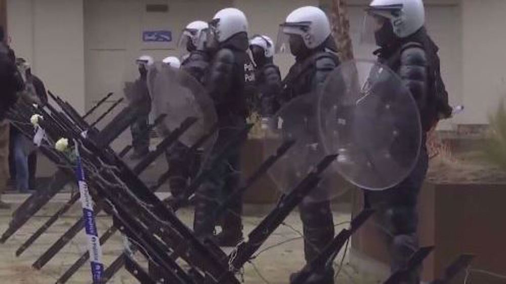 Protesters, police clash in Brussels over renewed COVID-19 restrictions