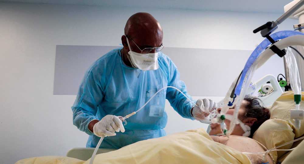 France breaks 100,000 barrier for 24-hour COVID infections