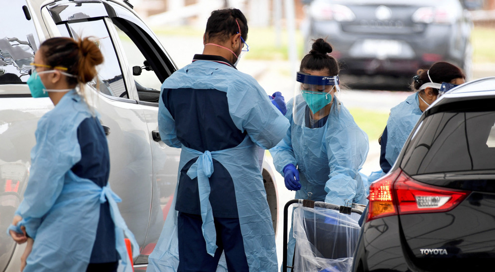 Australia records first Omicron death as daily COVID-19 cases surge 