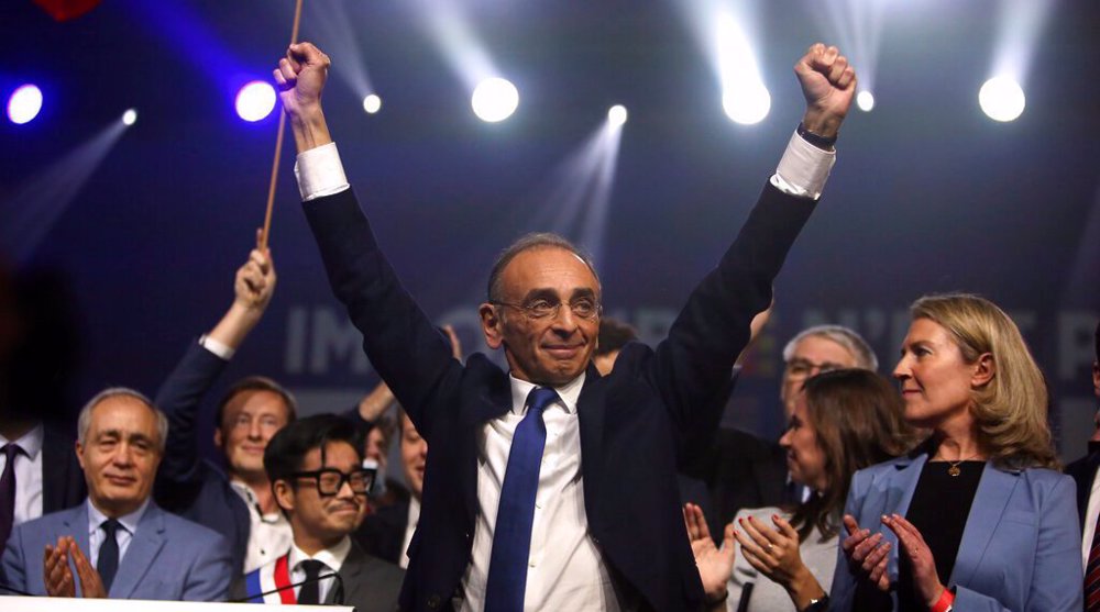 French far-right supporters throw punches and chairs during election rally