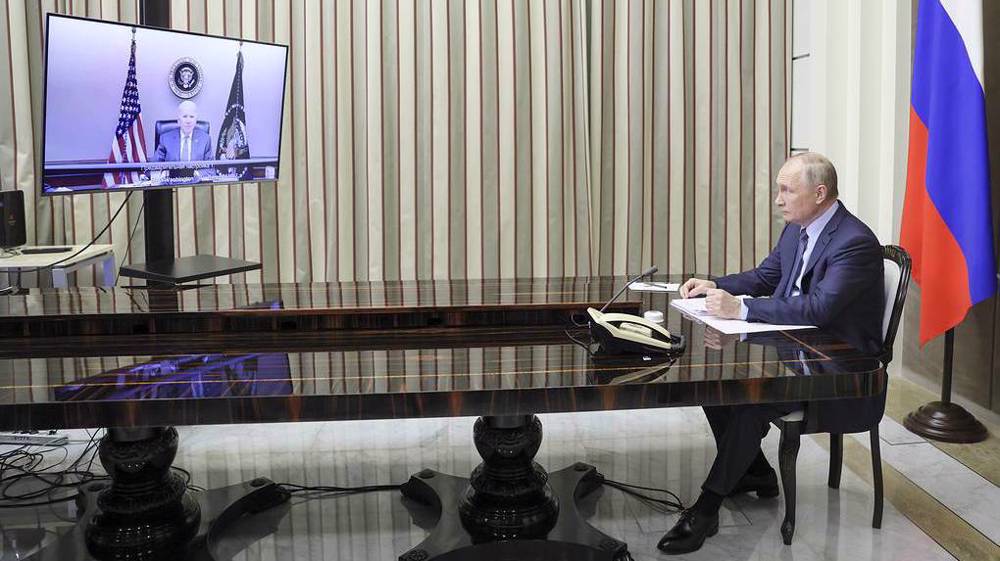 Biden warns Russia of sanctions; Putin demands guarantees against NATO expansion