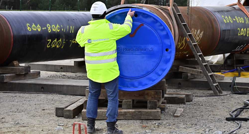 France urges Germany to scrap Russia gas pipeline over Navalny