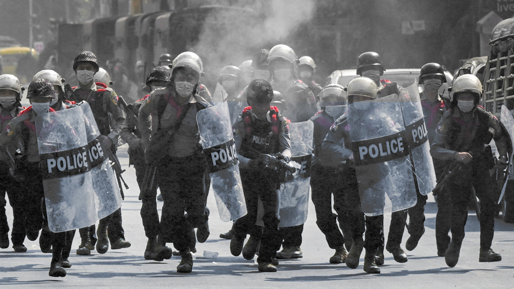 Woman shot as Myanmar’s police intensify crackdown on protesters